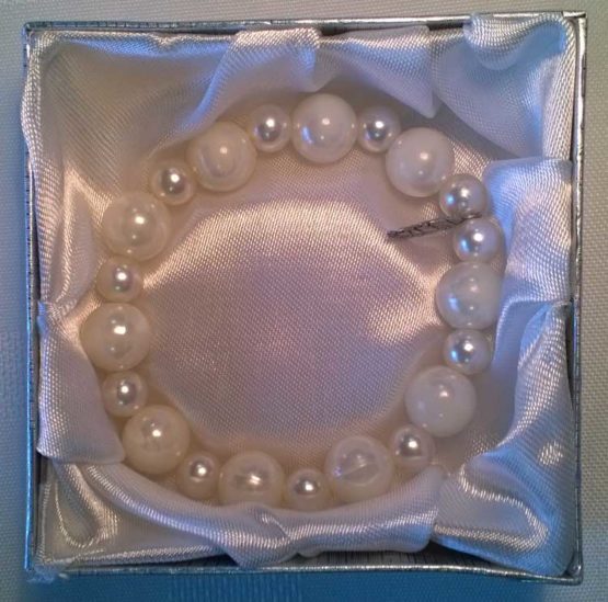 White Beaded Bracelet within Lined Box